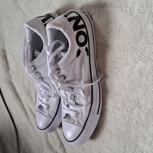 Converse men's size 10.5 or women's size 12.5 black and white sneakers